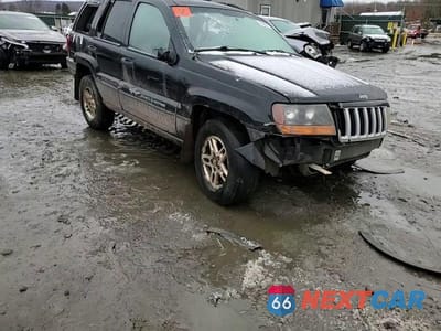 Zdjęcie 12 z 14 samochodu: 2004 JEEP GRAND CHEROKEE LAREDO VIN:1J4GW48S94C379217 - miniatura