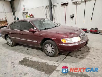 Zdjęcie 11 z 14 samochodu: 2002 LINCOLN CONTINENTAL VIN:1LNHM97V42Y687688 - miniatura