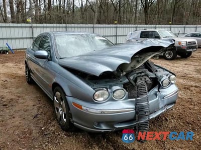 Zdjęcie 10 z 14 samochodu: 2003 JAGUAR X-TYPE 3.0 VIN:SAJEA51C13WD39882 - miniatura