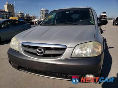 Zdjęcie 12 z 15 samochodu: 2003 MAZDA TRIBUTE LX VIN:4F2YZ941X3KM52191 - miniatura