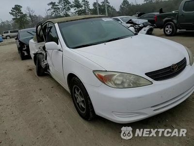 Zdjęcie 10 z 13 samochodu: 2002 TOYOTA CAMRY LE VIN:4T1BE32K32U031079 - miniatura