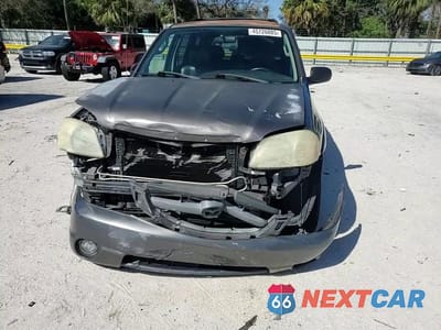 Zdjęcie 11 z 16 samochodu: 2003 MAZDA TRIBUTE ES VIN:4F2CZ06143KM32909 - miniatura