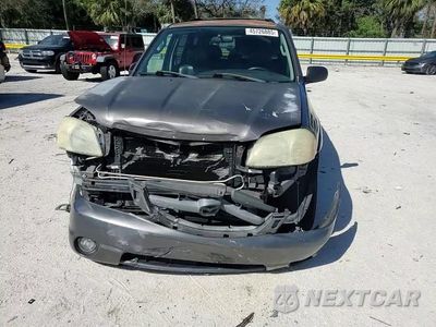 Zdjęcie 12 z 15 samochodu: 2003 MAZDA TRIBUTE ES VIN:4F2CZ06143KM32909 - miniatura