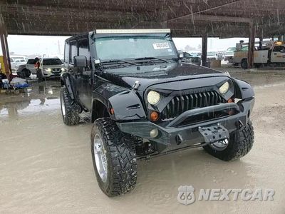 Zdjęcie 11 z 14 samochodu: 2008 JEEP WRANGLER UNLIMITED SAHARA VIN:1J8GB59118L589452 - miniatura