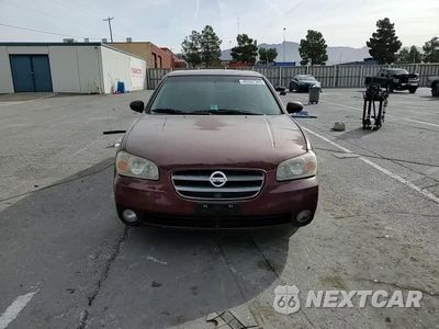 Zdjęcie 10 z 14 samochodu: 2003 NISSAN MAXIMA GLE VIN:JN1DA31D03T508198 - miniatura