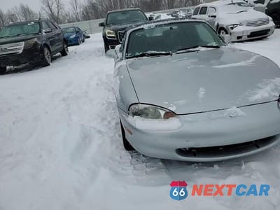Zdjęcie 10 z 14 samochodu: 1999 MAZDA MX-5 MIATA VIN:JM1NB3531X0115463 - miniatura