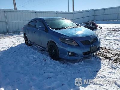 Zdjęcie 11 z 14 samochodu: 2009 TOYOTA COROLLA BASE VIN:1NXBU40EX9Z035632 - miniatura