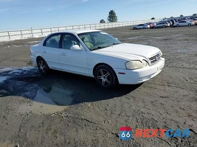 Zdjęcie 10 z 14 samochodu: 2005 KIA OPTIMA LX VIN:KNAGD126655382519 - miniatura