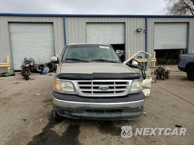 Zdjęcie 11 z 14 samochodu: 1999 FORD F150 VIN:1FTRX17WXXKC22210 - miniatura