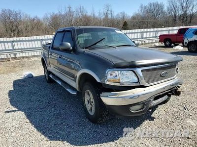 Zdjęcie 13 z 16 samochodu: 2003 FORD F150 SUPERCREW VIN:1FTRW08L53KA18832 - miniatura