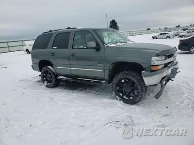 Zdjęcie 12 z 15 samochodu: 2001 CHEVROLET TAHOE K1500 VIN:1GNEK13T21R111651 - miniatura