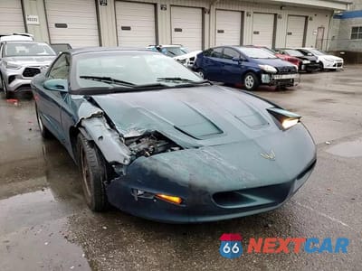 Zdjęcie 10 z 13 samochodu: 1995 PONTIAC FIREBIRD VIN:2G2FS22S3S2229549 - miniatura