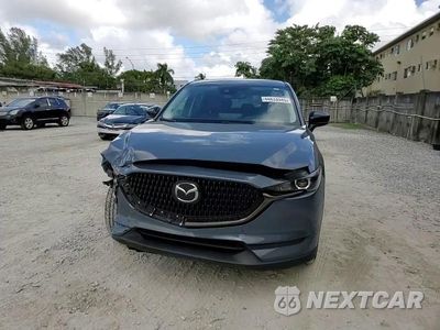 Zdjęcie 11 z 15 samochodu: 2021 MAZDA CX-5 TOURING VIN:JM3KFACM9M0363423 - miniatura