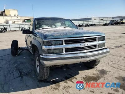 Zdjęcie 12 z 15 samochodu: 1995 CHEVROLET TAHOE K1500 VIN:1GNEK18K5SJ309625 - miniatura