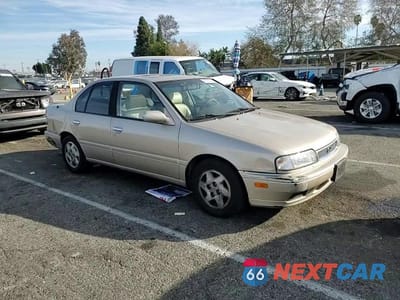Zdjęcie 11 z 14 samochodu: 1996 INFINITI G20 VIN:JNKCP01D9TT534495 - miniatura