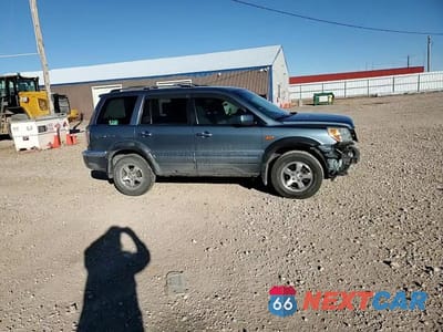 Zdjęcie 15 z 15 samochodu: 2006 HONDA PILOT EX VIN:2HKYF18436H521109 - miniatura