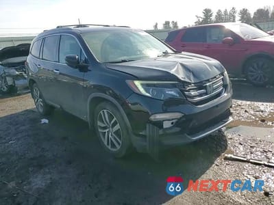 Zdjęcie 14 z 14 samochodu: 2017 HONDA PILOT ELITE VIN:5FNYF6H01HB013460 - miniatura