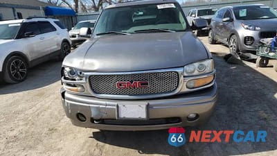 Zdjęcie 14 z 14 samochodu: 2006 GMC YUKON XL DENALI VIN:1GKFK66U36J166098 - miniatura
