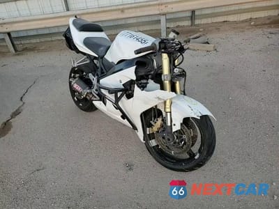 Zdjęcie 11 z 11 samochodu: 2004 SUZUKI GSX-R600 K VIN:JS1GN7CA642110827 - miniatura
