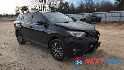 Zdjęcie 14 z 14 samochodu: 2016 TOYOTA RAV4 HYBRID VIN:JTMRJREV6GD023704 - miniatura