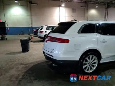 Zdjęcie 14 z 14 samochodu: 2012 LINCOLN MKT VIN:2LMHJ5AT5CBL50233 - miniatura
