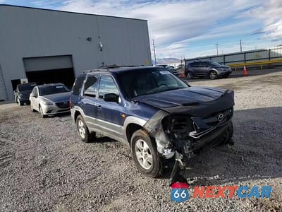 Zdjęcie 14 z 14 samochodu: 2002 MAZDA TRIBUTE LX VIN:4F2YU081X2KM33871 - miniatura