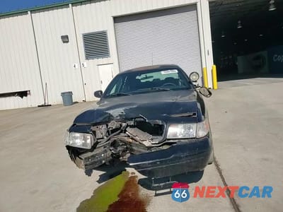 Zdjęcie 13 z 13 samochodu: 2009 FORD CROWN VICTORIA POLICE INTERCEPTOR VIN:2FAHP71V59X114730 - miniatura