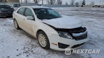 Zdjęcie 14 z 14 samochodu: 2012 FORD FUSION HYBRID VIN:3FADP0L38CR275421 - miniatura