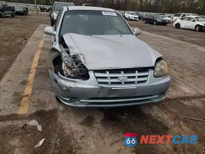 Zdjęcie 12 z 14 samochodu: 2005 HYUNDAI ACCENT GS VIN:KMHCG35C45U340339 - miniatura