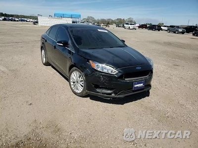 Zdjęcie 11 z 15 samochodu: 2016 FORD FOCUS TITANIUM VIN:1FADP3J22GL201721 - miniatura
