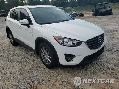 Zdjęcie 10 z 13 samochodu: 2016 MAZDA CX-5 TOURING VIN:JM3KE2CY7G0815255 - miniatura