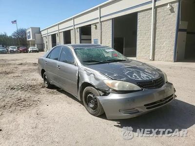 Zdjęcie 11 z 13 samochodu: 2004 TOYOTA CAMRY LE VIN:4T1BE32K54U916113 - miniatura