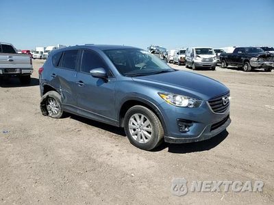 Zdjęcie 11 z 14 samochodu: 2016 MAZDA CX-5 TOURING VIN:JM3KE2CY7G0797890 - miniatura