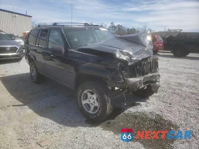 Zdjęcie 12 z 15 samochodu: 1996 JEEP GRAND CHEROKEE LAREDO VIN:1J4EZ58S4TC103918 - miniatura