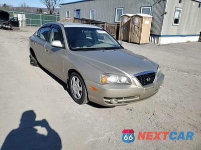 Zdjęcie 10 z 14 samochodu: 2002 HYUNDAI ELANTRA GLS VIN:KMHDN45D62U395234 - miniatura