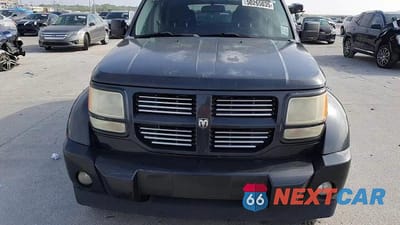 Zdjęcie 12 z 15 samochodu: 2011 DODGE NITRO HEAT VIN:1D4PT4GK2BW576387 - miniatura