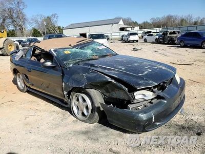 Zdjęcie 10 z 13 samochodu: 1998 FORD MUSTANG VIN:1FAFP4448WF146815 - miniatura