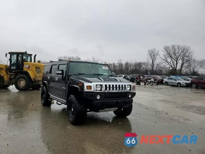 Zdjęcie 12 z 15 samochodu: 2005 HUMMER H2 VIN:5GRGN23UX5H120888 - miniatura