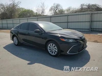 Zdjęcie 11 z 14 samochodu: 2024 TOYOTA CAMRY LE VIN:4T1C11AK4RU258085 - miniatura