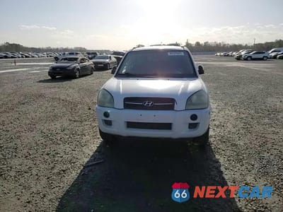 Zdjęcie 12 z 15 samochodu: 2006 HYUNDAI TUCSON GL VIN:KM8JM12B26U252438 - miniatura