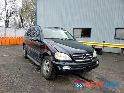 Zdjęcie 12 z 15 samochodu: 2003 MERCEDES-BENZ ML 320 VIN:4JGAB54E63A376729 - miniatura