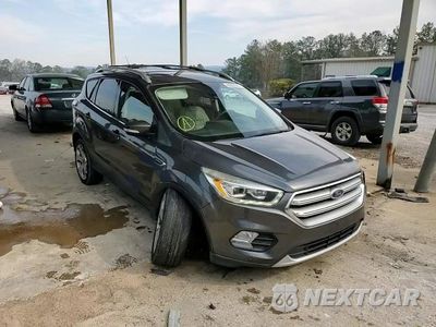 Zdjęcie 10 z 15 samochodu: 2017 FORD ESCAPE TITANIUM VIN:1FMCU0J91HUD04386 - miniatura