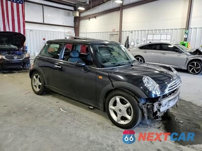 Zdjęcie 11 z 14 samochodu: 2005 MINI COOPER VIN:WMWRC33595TJ72148 - miniatura