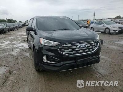 Zdjęcie 12 z 16 samochodu: 2021 FORD EDGE TITANIUM VIN:2FMPK3K97MBA03810 - miniatura