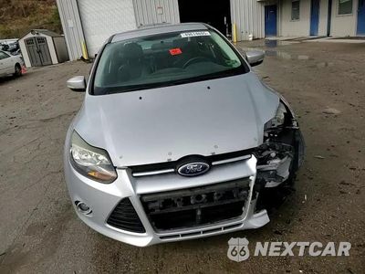 Zdjęcie 10 z 13 samochodu: 2014 FORD FOCUS TITANIUM VIN:1FADP3J2XEL222328 - miniatura