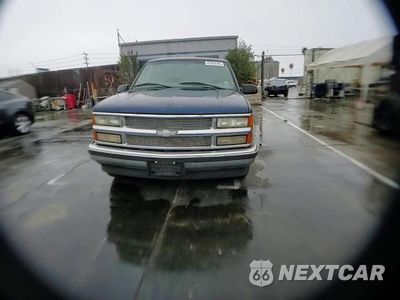 Zdjęcie 12 z 15 samochodu: 1999 CHEVROLET SUBURBAN C1500 VIN:3GNEC16R6XG254396 - miniatura