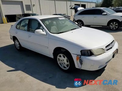 Zdjęcie 10 z 15 samochodu: 1999 NISSAN ALTIMA XE VIN:1N4DL01D5XC203412 - miniatura