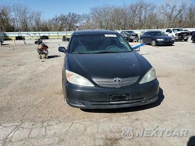 Zdjęcie 11 z 14 samochodu: 2004 TOYOTA CAMRY LE VIN:4T1BF32K24U078703 - miniatura