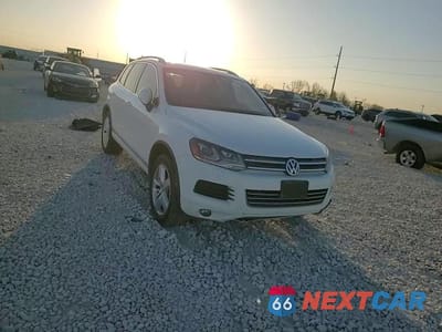 Zdjęcie 11 z 15 samochodu: 2014 VOLKSWAGEN TOUAREG V6 TDI VIN:WVGEP9BP0ED001256 - miniatura