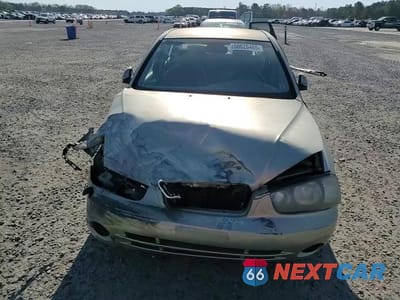 Zdjęcie 10 z 14 samochodu: 2002 HYUNDAI ELANTRA GLS VIN:KMHDN45D22U399216 - miniatura